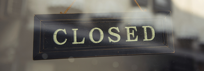 Close up of closed shop sign