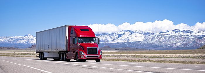 truck driving along highway.