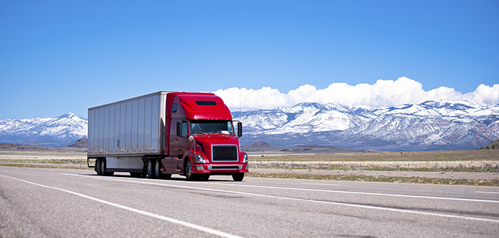 truck driving along highway.