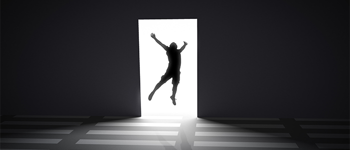 person jumping in doorway