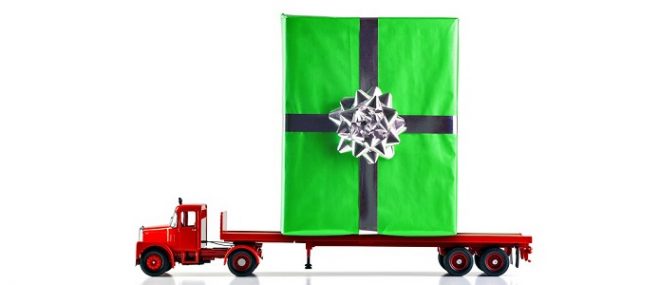 Christmas gift on a flatbed truck.
