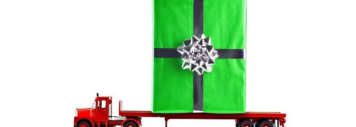 Christmas gift on a flatbed truck.