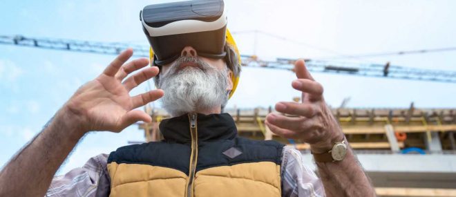 man with VR headset on construction site.