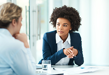 A legal professional having a one-on-one discussion with a client.