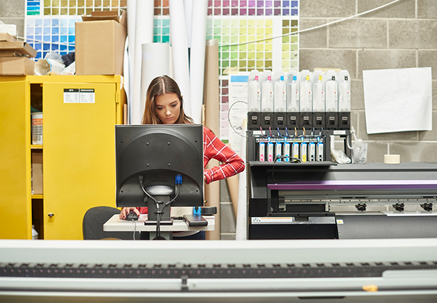 Female preparing files for print