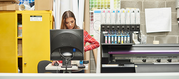 Female preparing files for print