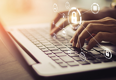 Hands typing on a keyboard with lock symbols hovering above.