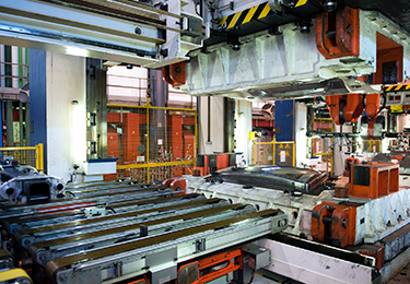 Inactive production machinery in a manufacturing factory.