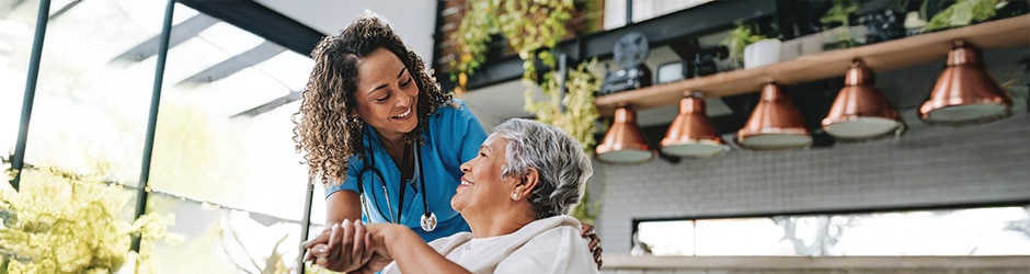 healthcare provider helping a patient