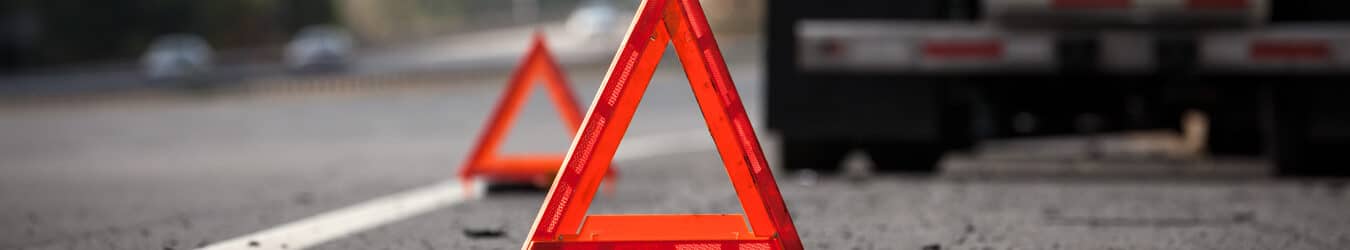 Warning Reflectors On Highway Indicating Disabled Truck