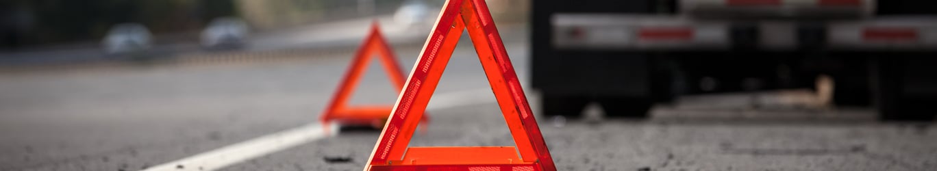 Warning Reflectors On Highway Indicating Disabled Truck