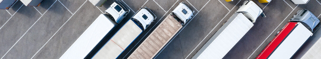 Large Group of Trucks at Truck Stop, Aerial View