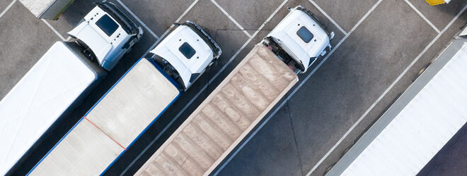 Large Group of Trucks at Truck Stop, Aerial View