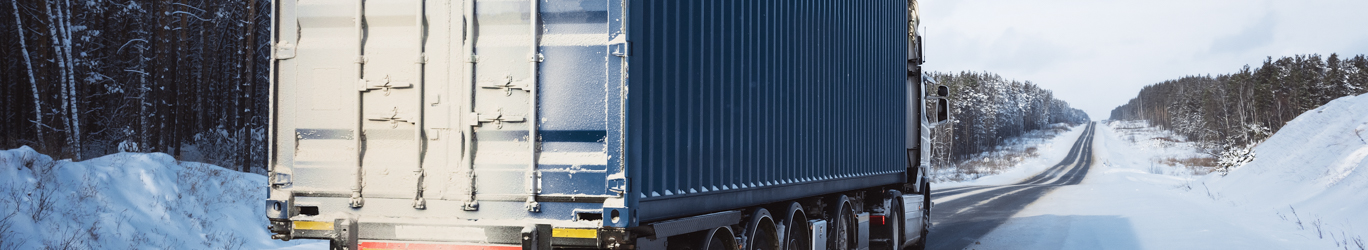 Freight truck on a winter road.